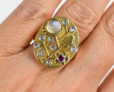 Lot 247 - A gold, moonstone, diamond and pink sapphire...