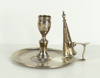 Lot 432 - A George III silver chamberstick decorated...