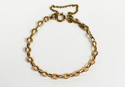 Lot 163 - A 9ct gold bracelet composed of hoop and box...