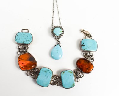 Lot 286 - A silver and turquoise set pendant necklace on...