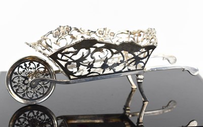 Lot 389 - A silver wheelbarrow, the pierced decorative...