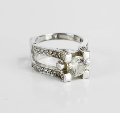 Lot 19 - A 14ct white gold and diamond dress ring, set...