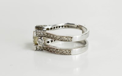 Lot 19 - A 14ct white gold and diamond dress ring, set...