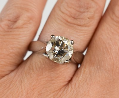 Lot 20 - An 18ct white gold and diamond solitaire ring,...