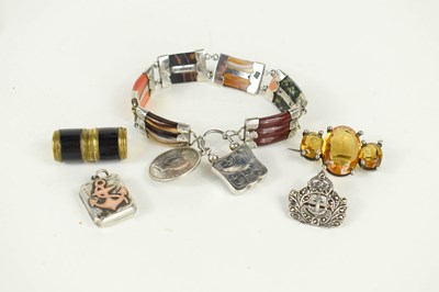 Lot 294 - A silver and agate set bracelet, with George...