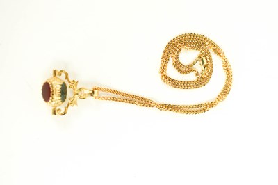 Lot 201 - A 9ct gold swivel fob pendant set with agate...