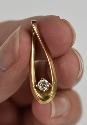 Lot 25 - A 14ct gold and diamond pendant, the tear drop...