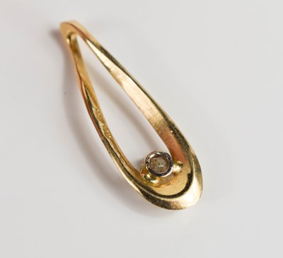 Lot 25 - A 14ct gold and diamond pendant, the tear drop...