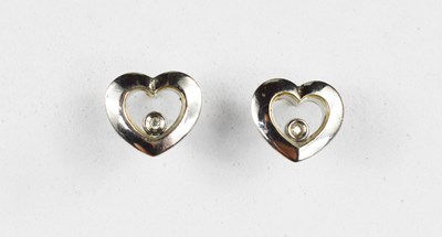 Lot 29 - A pair of 9ct white gold heart shaped earrings...
