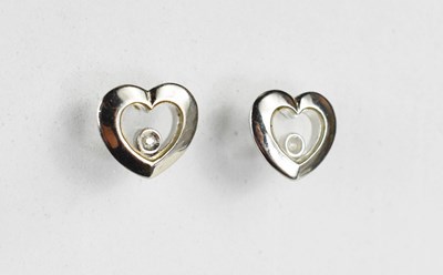 Lot 29 - A pair of 9ct white gold heart shaped earrings...