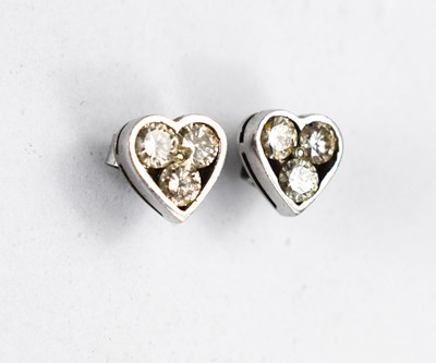 Lot 33 - A pair of 18ct white gold and diamond earrings,...