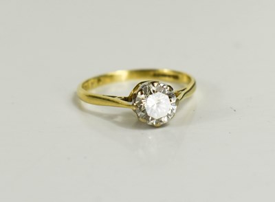 Lot 279 - An 18ct gold and diamond solitaire ring, the...