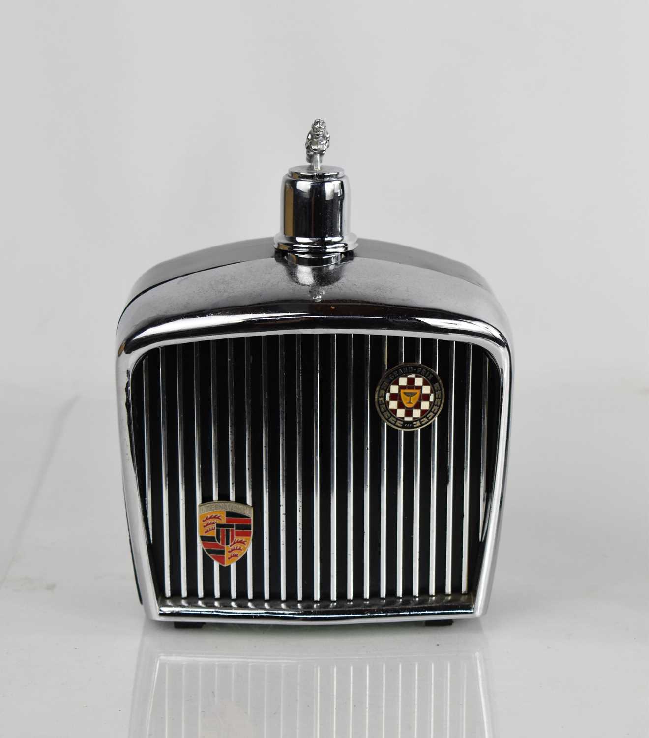 Lot 388 - A novelty Jaguar musical grill decanter.