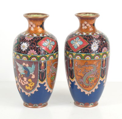 Lot 47 - A pair of Chinese cloisonne vases decorated...