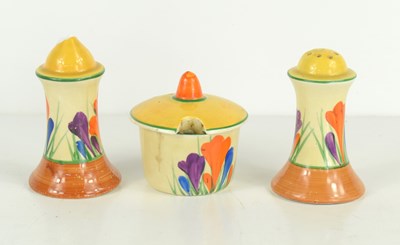 Lot 424 - A Clarice Cliff "Bizarre Ware" muffineer cruet...