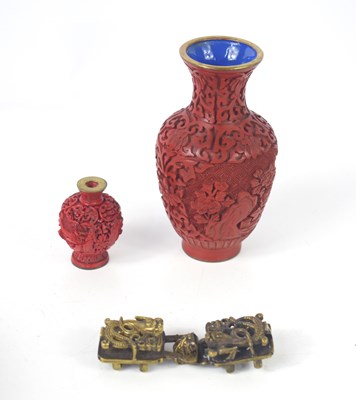 Lot 129 - A small Chinese cinnabar snuff bottle,...