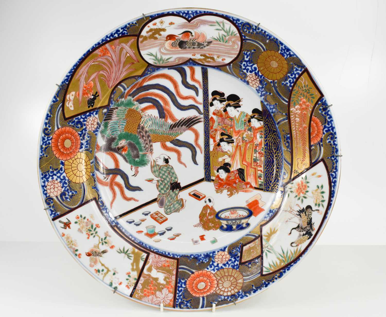 Lot 5 - An Edo period Imari charger, the central...