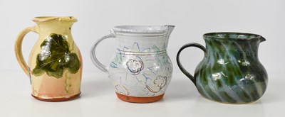 Lot 355 - A group of three studio pottery jugs,...