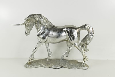 Lot 148 - A silvered plaster figure of a unicorn.