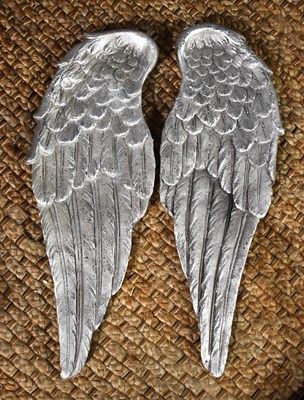 Lot 150 - A pair of silvered plaster angel wings.