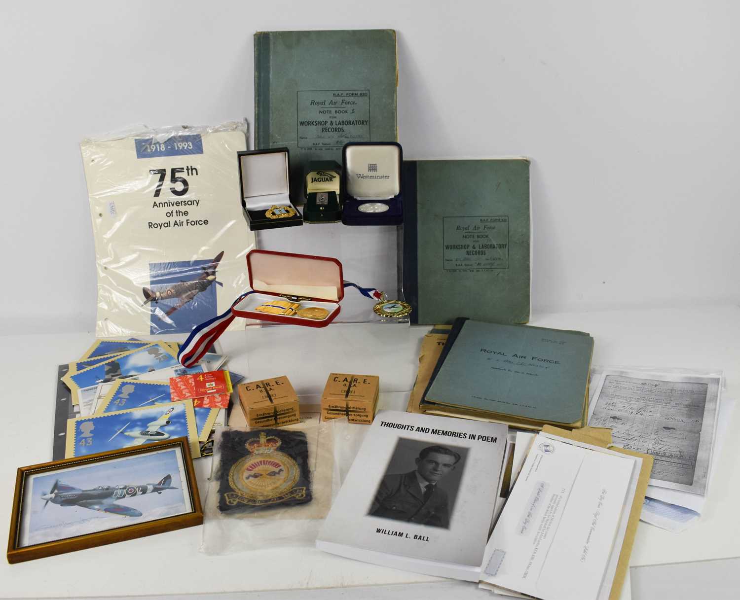 Lot 34 - A group of militaria, to include RAF note...