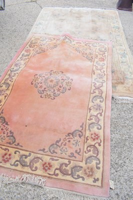 Lot 518 - Two Chinese wool rugs, in pastel shades, both...