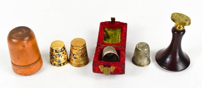 Lot 145 - A group of thimbles, to include enamel and...