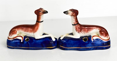 Lot 346 - A pair of Staffordshire seated greyhounds,...