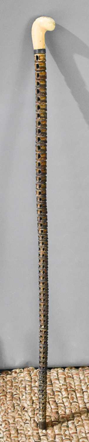 Lot 340 - An antique shark spine vertebrae walking cane...