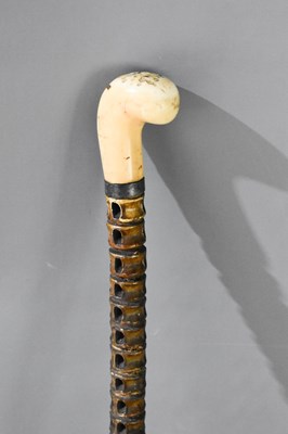 Lot 340 - An antique shark spine vertebrae walking cane...