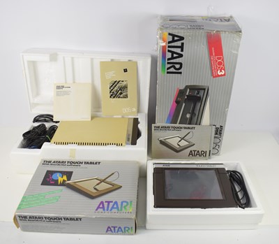 Lot 309 - An Atari 1050 disk drive together with an...