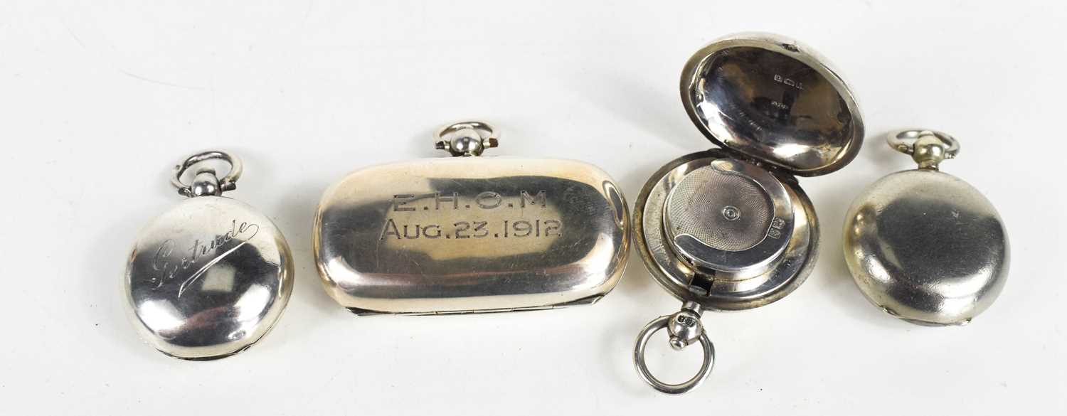 Lot 288 - Three silver coin holders, one engraved...