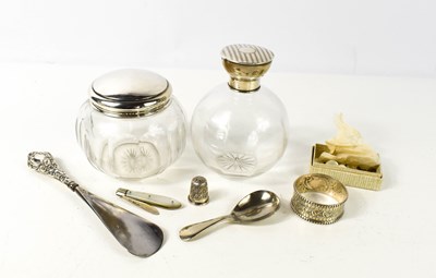 Lot 119 - Two silver and glass dressing table bottles;...