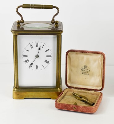 Lot 456 - A French brass carriage clock, with Roman...