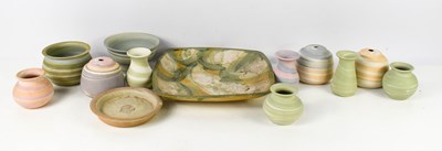 Lot 349 - A selection of Studio pottery, in muted...