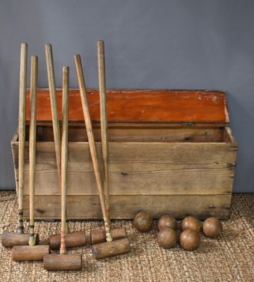 Lot 276 - A pine cased vintage croquet set comprising...