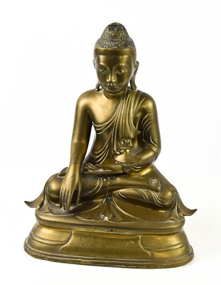 Lot 103 - An early 20th century Burmese Buddha statue in...