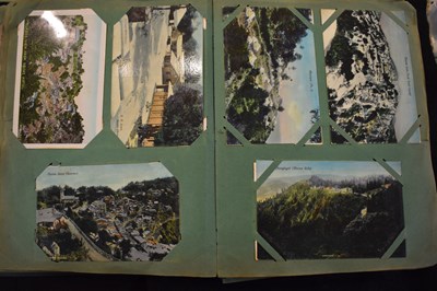 Lot 28 - An early 20th century postcard album, the vast...
