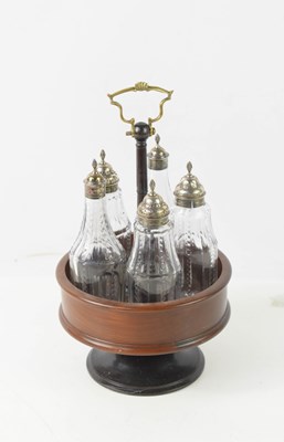 Lot 404 - A treen and silver cruet set, the five cut...