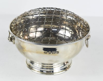 Lot 131 - A silver flower bowl, with twin lion head and...