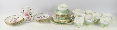 Lot 394 - A group of bone china tea ware, to include...