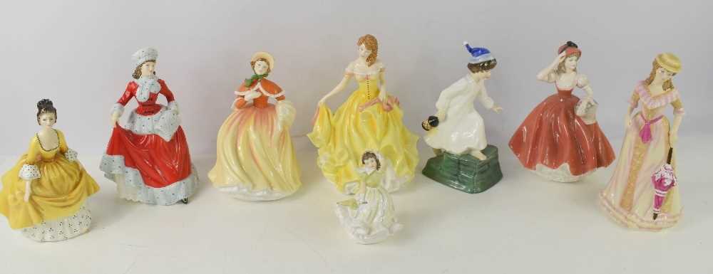 Lot 420 - A group of porcelain Royal Doulton figurines,...