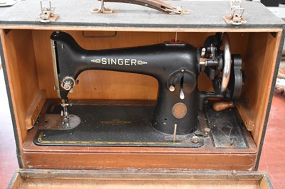 Lot 166 - A vintage Singer sewing machine, hand crank,...