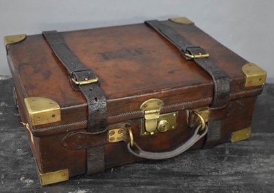 Lot 19 - An early 20th century leather cartridge case,...