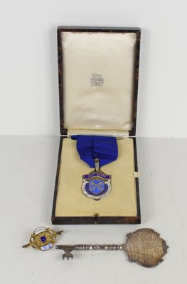 Lot 242 - A silver key, medal and brooch awarded to the...