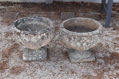 Lot 530 - Two reconstituted stone planters raised on a...