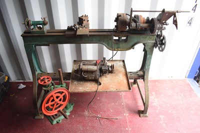 Lot 537 - A vintage metal turning lathe with single...