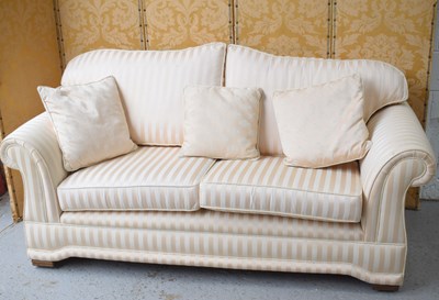 Lot 522 - A country house style two seater sofa with...