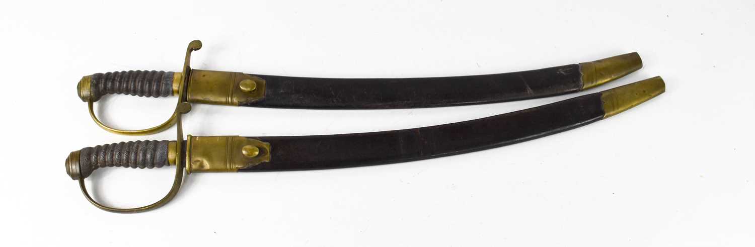 Lot 38 - A pair of 19th century police swords, by JW...