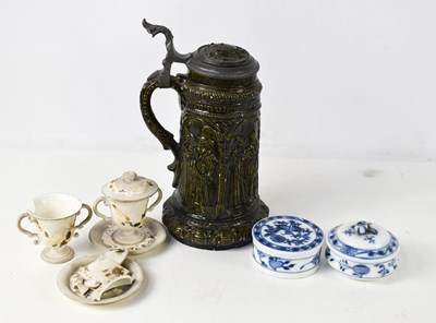 Lot 399 - A German green glazed pottery stein with...